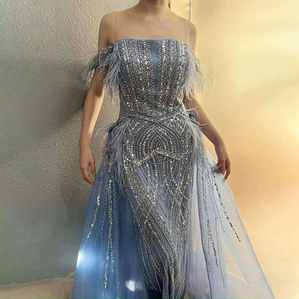 Limited Time Serene Hill 2024 Blue Mermaid Gown Luxury Feathers Beaded Saudi Evening Dress with Overlay Skirt for Formal Occasion LA72727 Limited Time Serene Hill 2024 Blue Mermaid Gown Luxury Feathers Beaded Saudi Evening Dress with Overlay Skirt for Formal Occasion LA72727