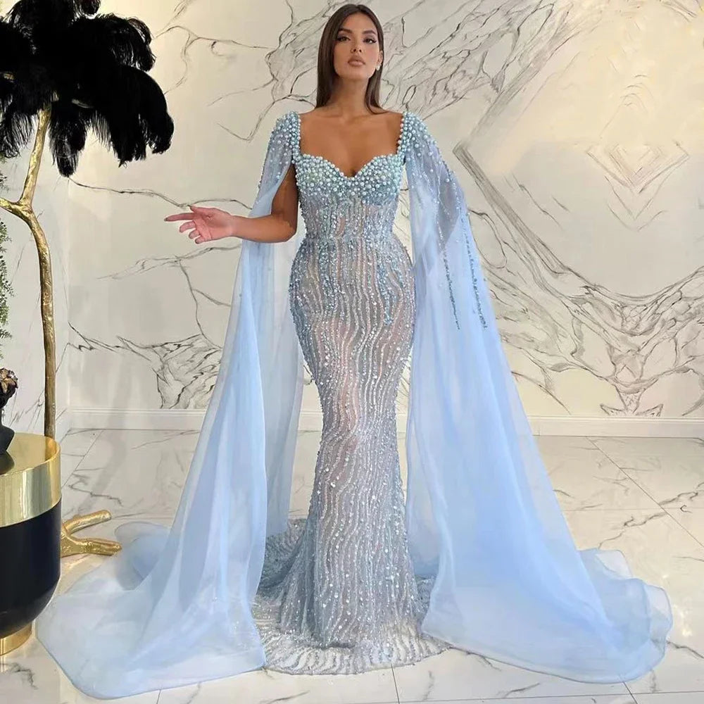 Now or Never Serene Hill Blue Arabic Luxury Beaded Mermaid Cape Sleeves Evening Dresses Gowns 2024 For Women Wedding Party LA71715 Now or Never Serene Hill Blue Arabic Luxury Beaded Mermaid Cape Sleeves Evening Dresses Gowns 2024 For Women Wedding Party LA71715