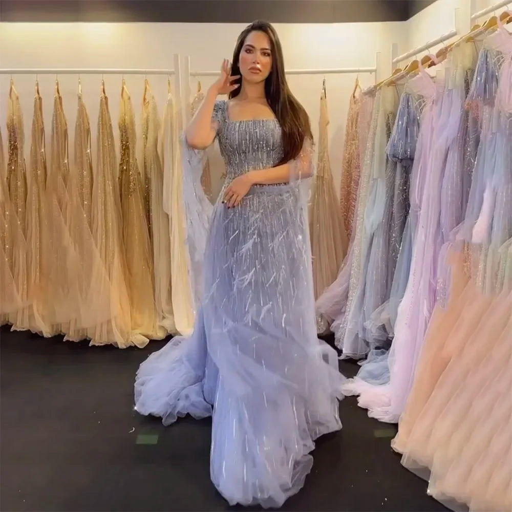 Price Reduction Serene Hill Luxury Dubai A Line Blue Cape Sleeves Feathers Beaded Evening Dresses Gowns 2024 For Women Wedding Party LA72236 Price Reduction Serene Hill Luxury Dubai A Line Blue Cape Sleeves Feathers Beaded Evening Dresses Gowns 2024 For Women Wedding Party LA72236