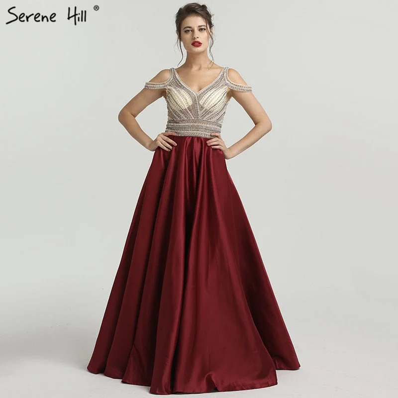Buy Now Wine Red V-Neck Satin Evening Gowns Sleeveless Beading Crystal A-Line Prom Dress LA6183 Buy Now Wine Red V-Neck Satin Evening Gowns Sleeveless Beading Crystal A-Line Prom Dress LA6183